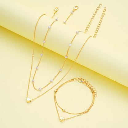 Silver Double-Layer Heart Charm Necklace and Bracelet Set – Women’s Layered Jewelry Set